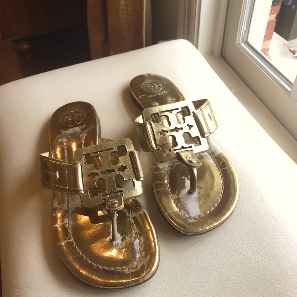 Tory Burch gold flip flop sandals